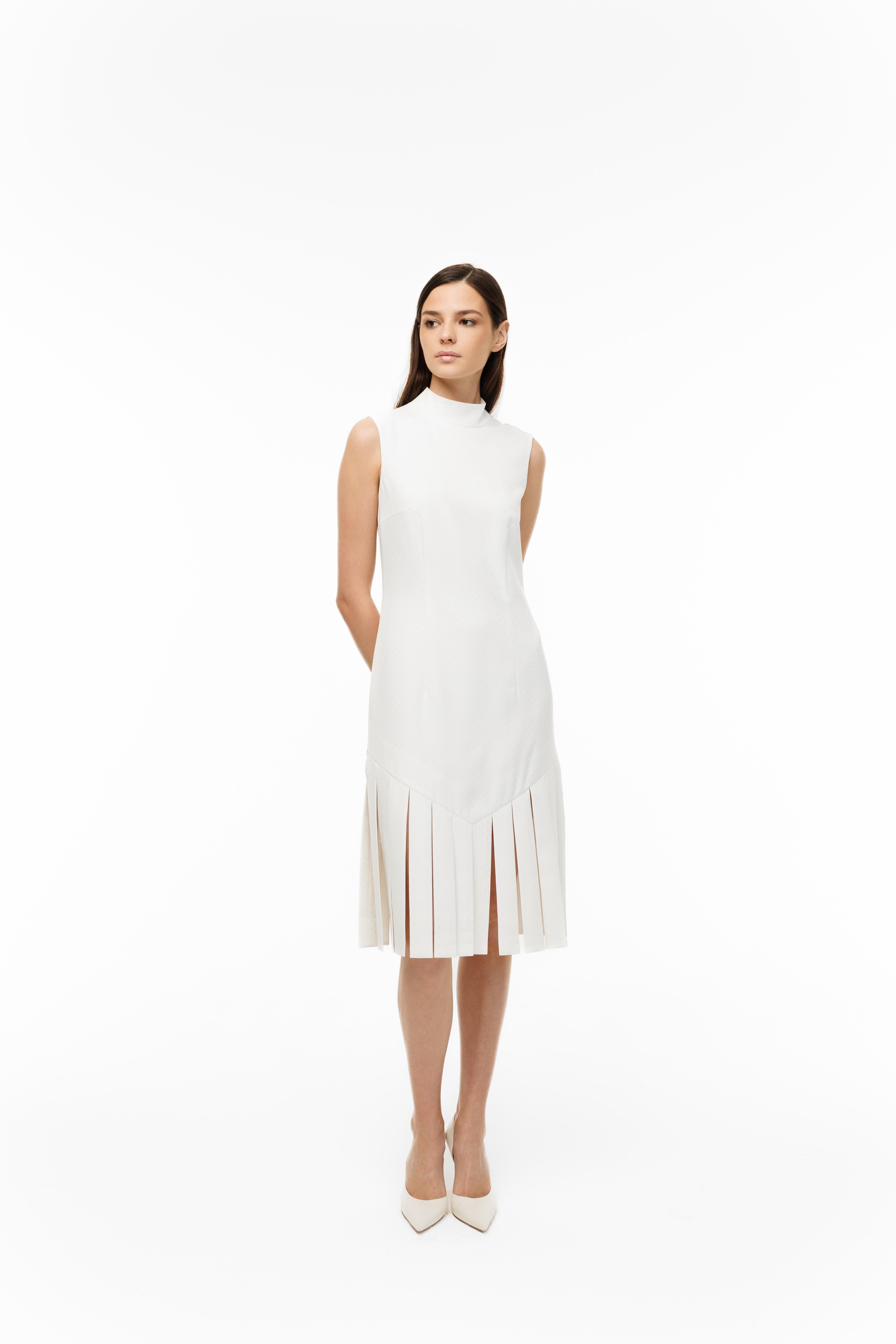 Woman wearing a white dress on a white background