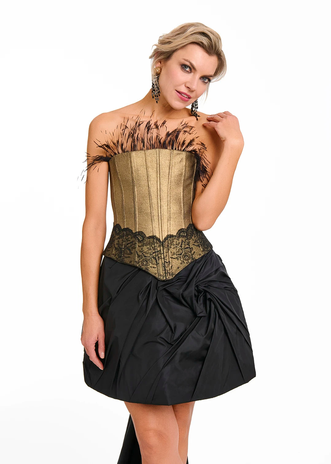 Woman wearing a Gold Denim Corset with feathered details by Mimaussy Paris on a white background