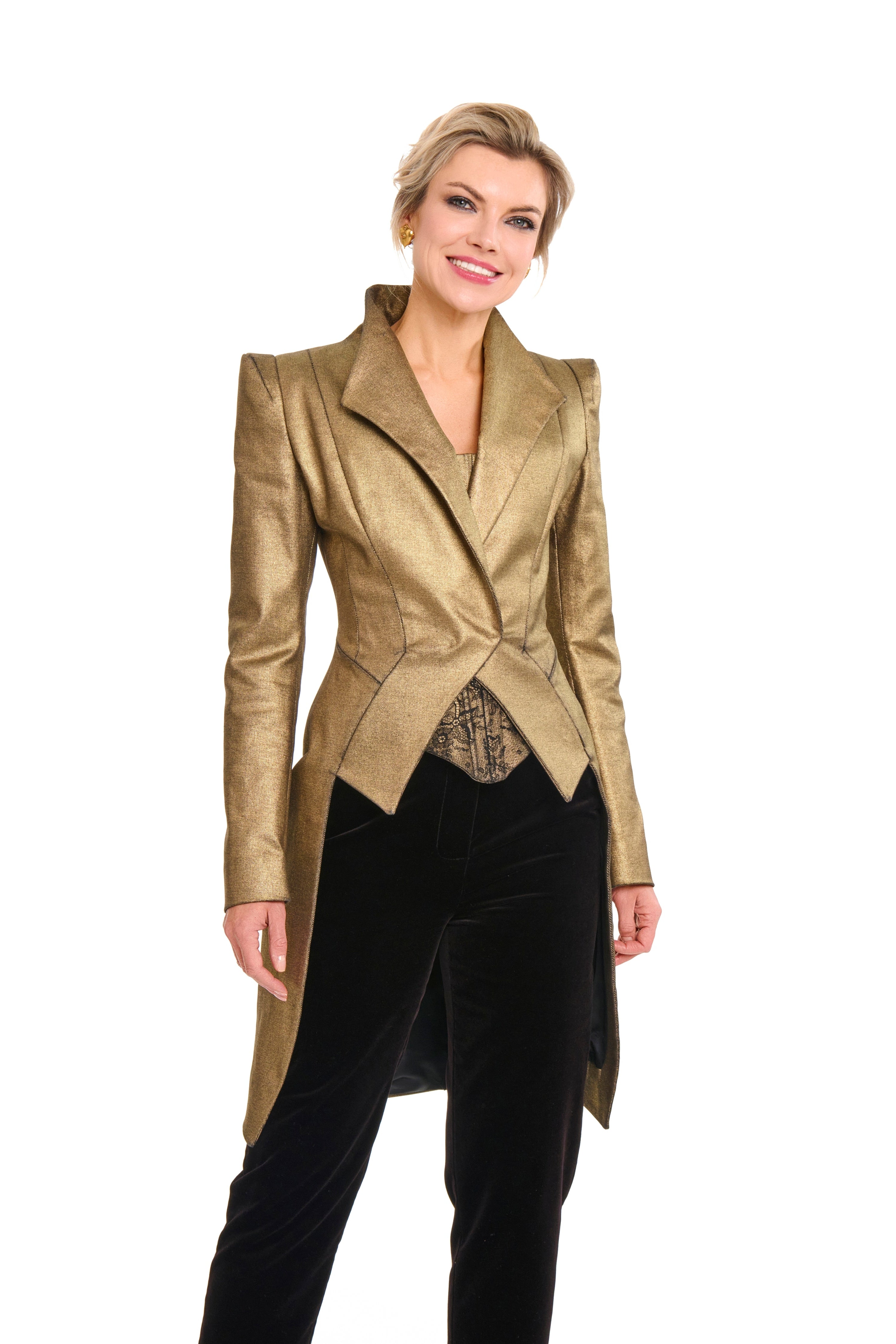 Woman wearing a Longline Gold Jacket from Mimaussy Paris, gold jacket with black pants, on a white background