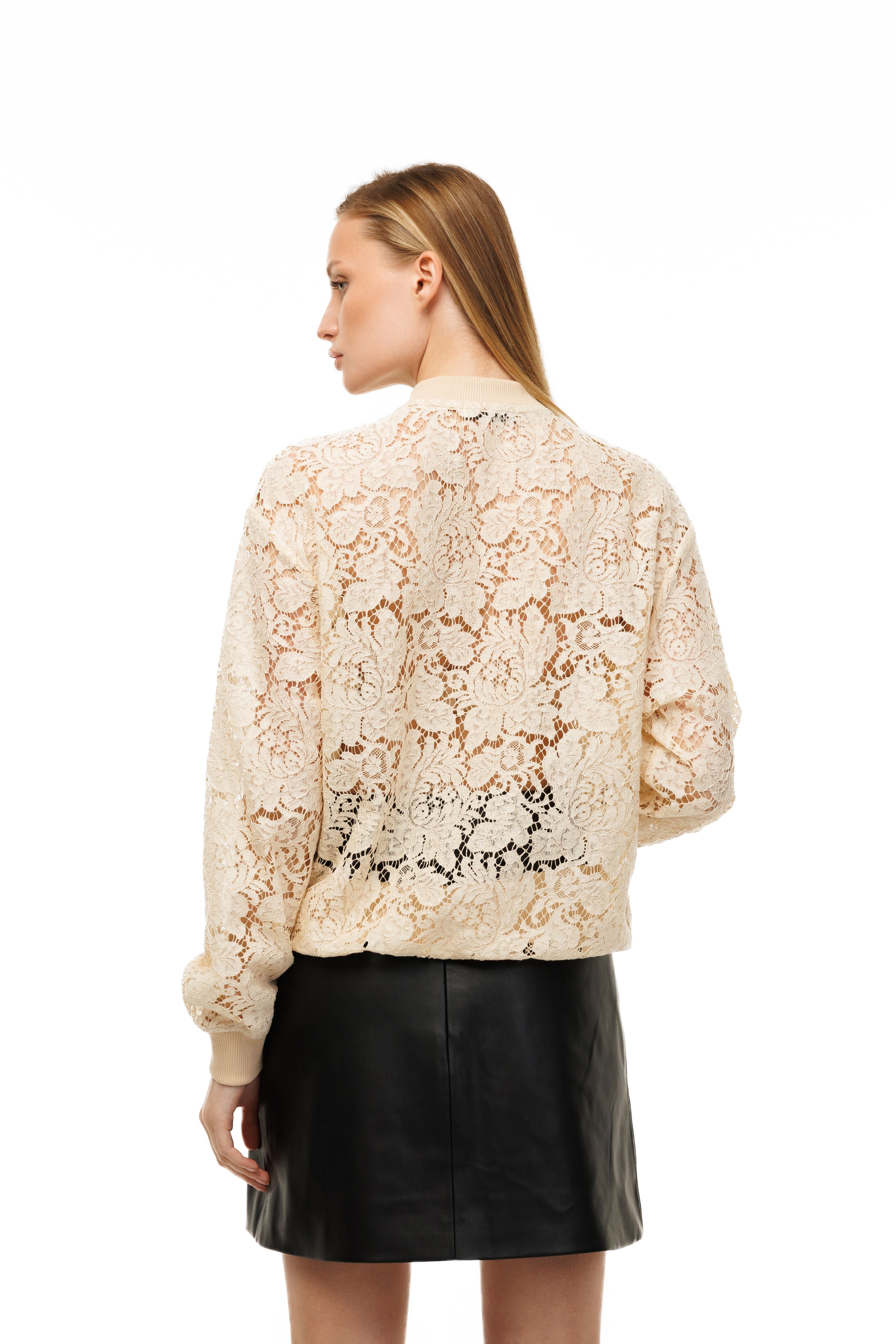 Woman wearing Riviera Lace Bomber by Mimaussy
