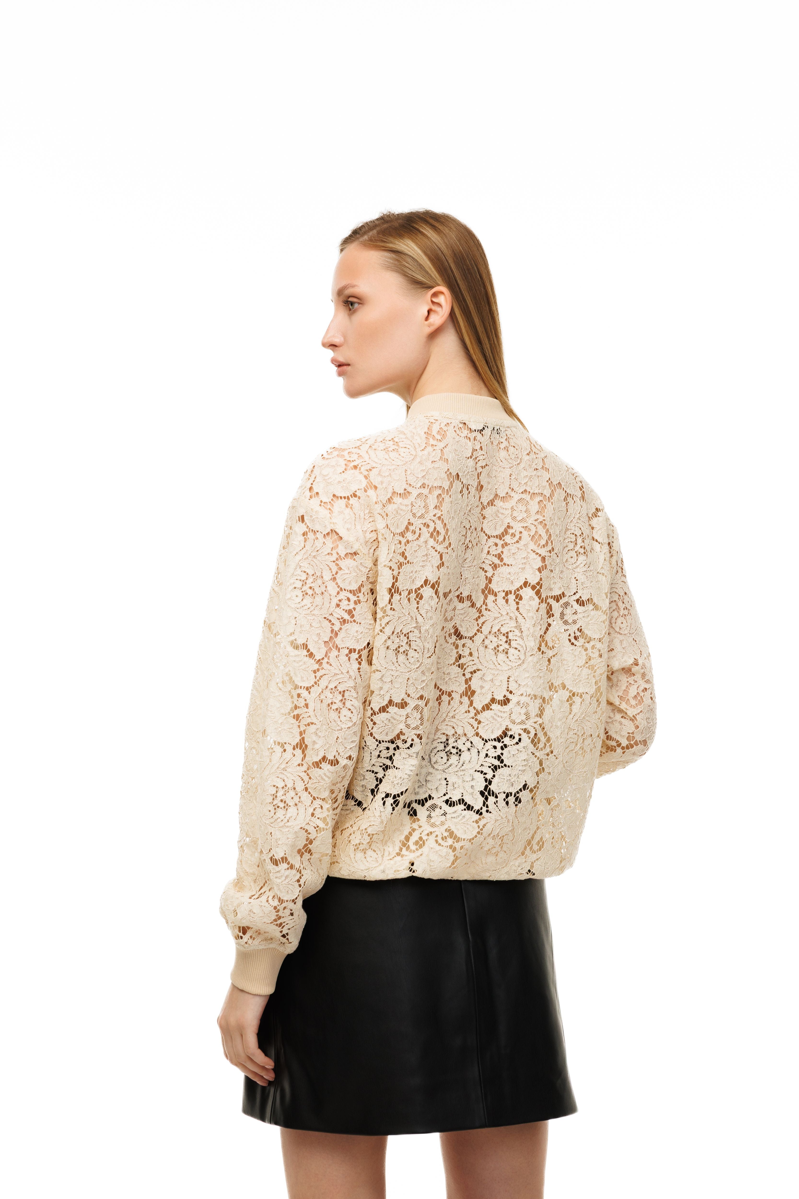 Woman wearing Riviera Lace Bomber by Mimaussy